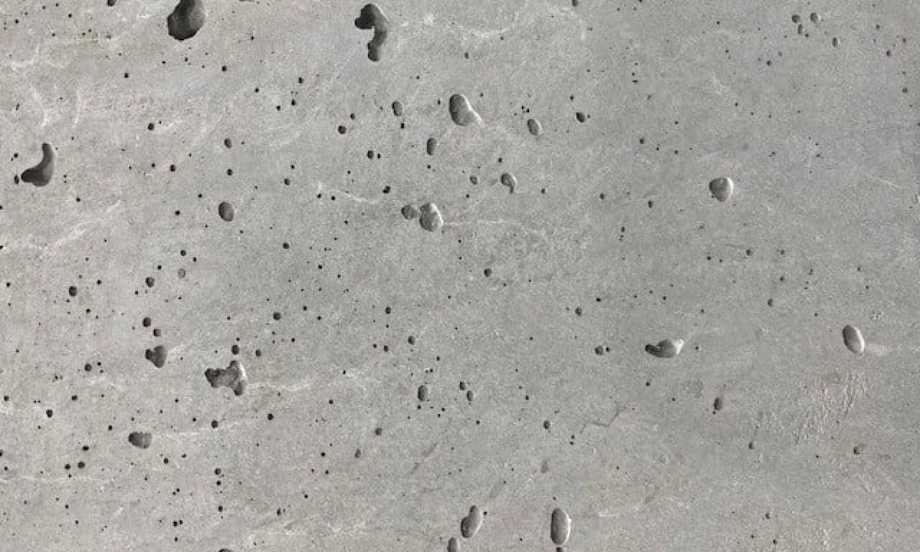 Concrete bugholes and surface voids